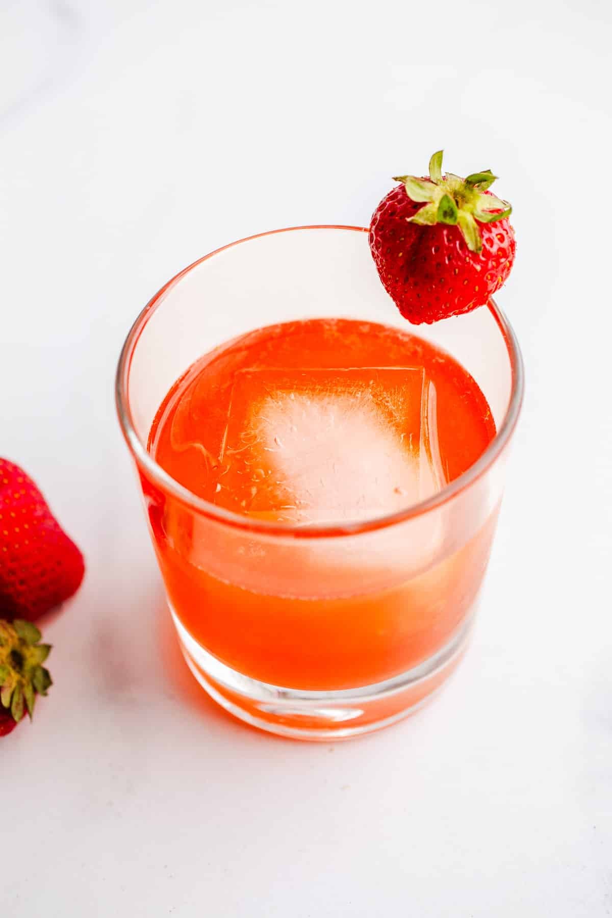 Strawberry sour with gin in a glass.