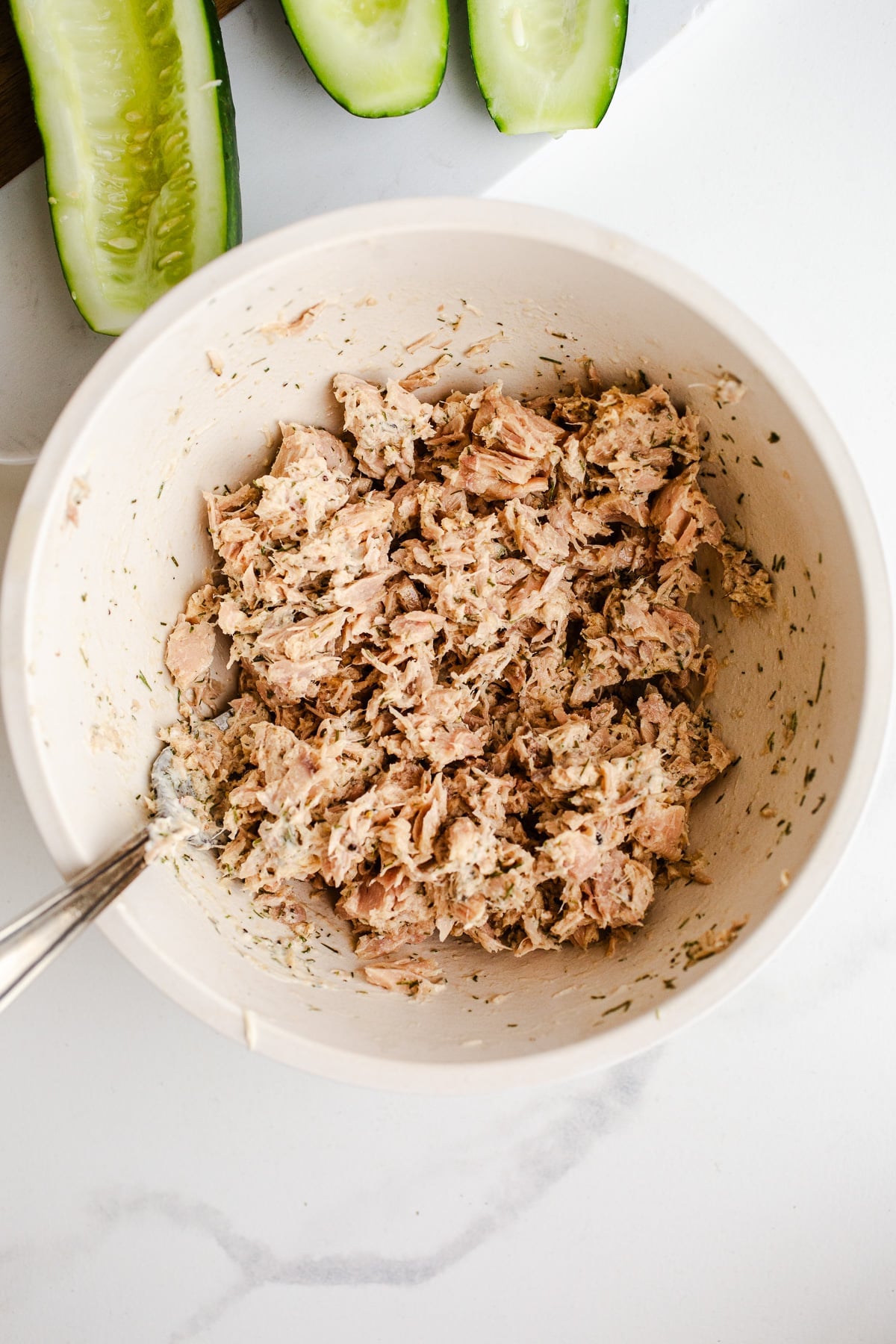 Tuna salad in a mixing bowl.