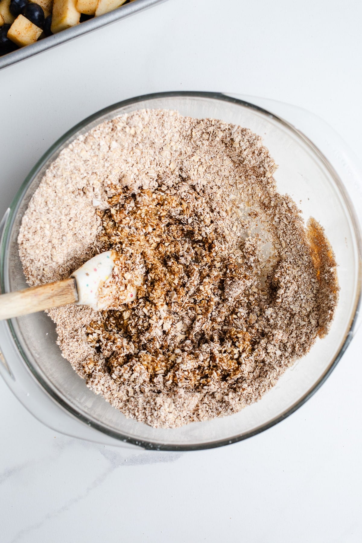 Oat flour and oats in a bowl.