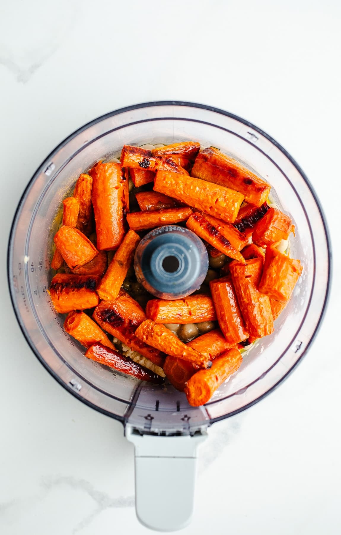 Carrots in a food processor.