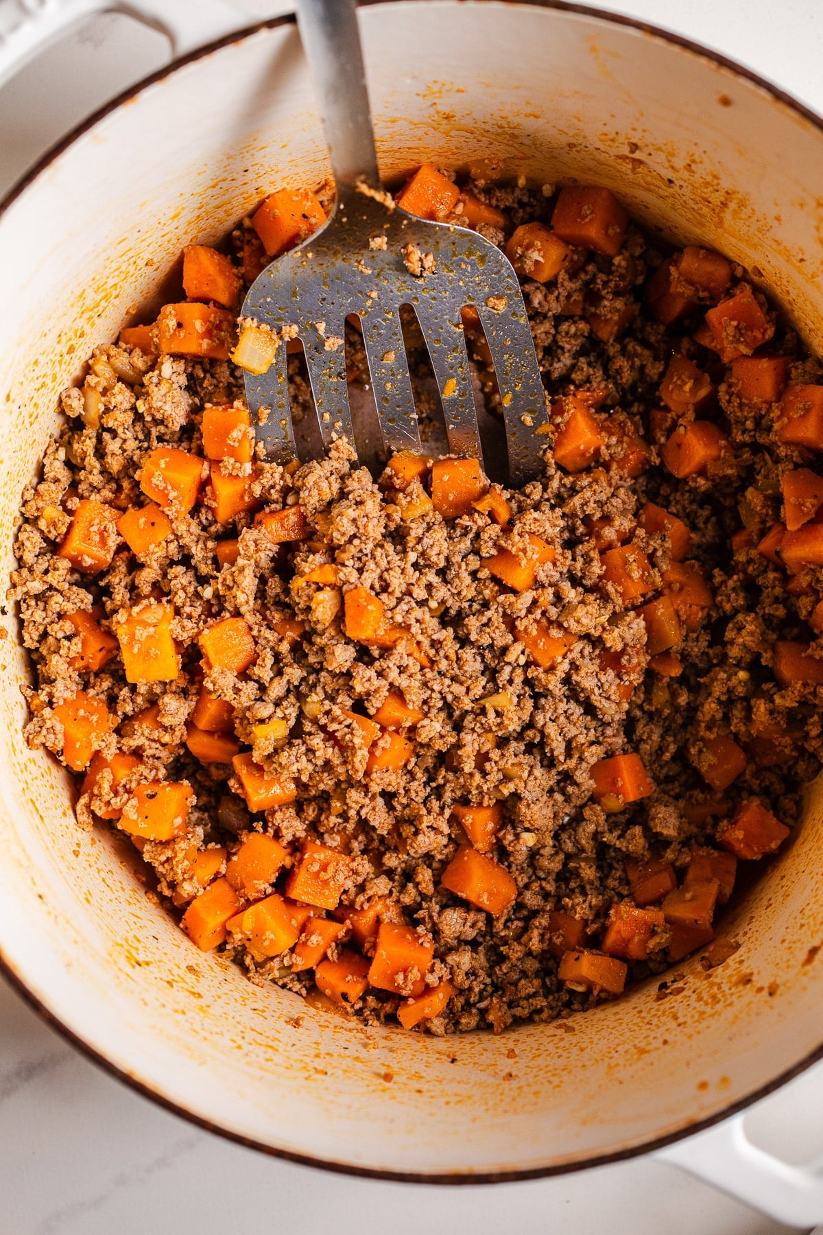 Cooked turkey and sweet potatoes.