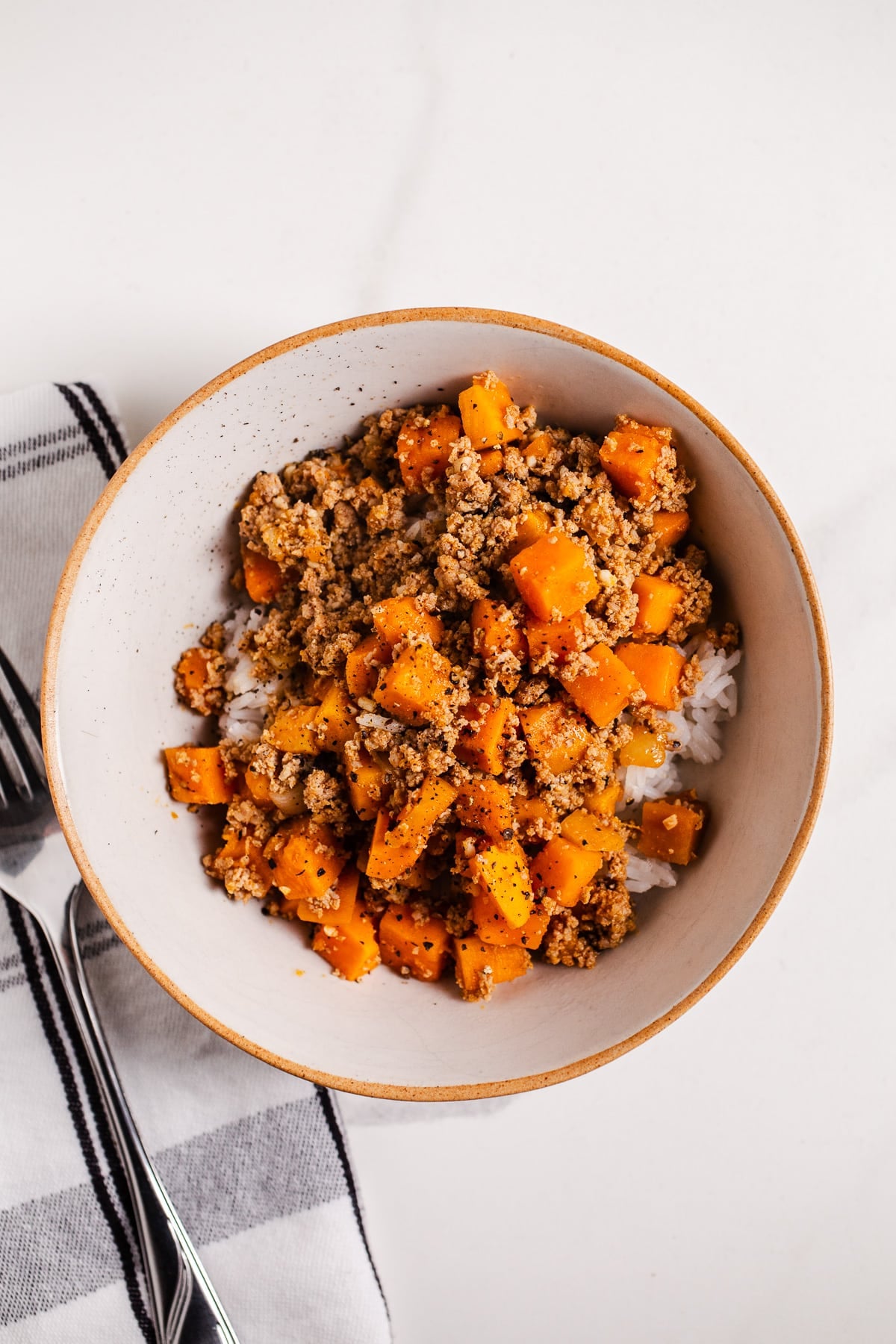 Turkey and sweet potato skillet over rice.