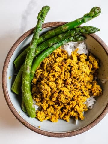 Ground turkey bowl with asparagus over rice.