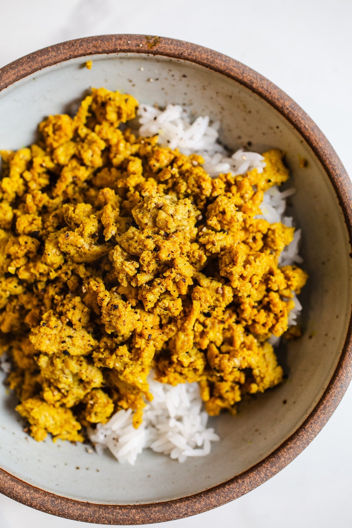 Ginger ground turkey over rice in a bowl.