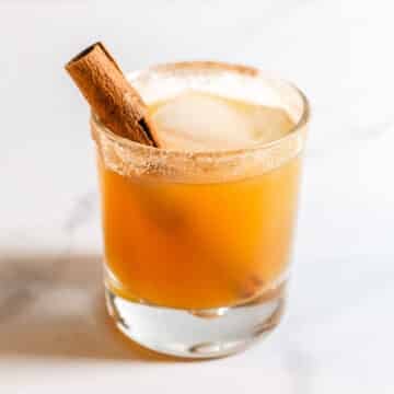 Apple cider cocktail in a rocks glass.
