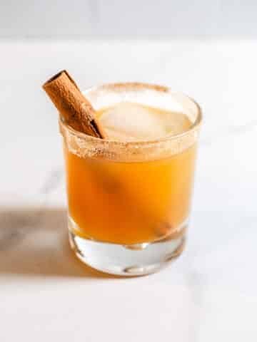 Apple cider cocktail in a rocks glass.