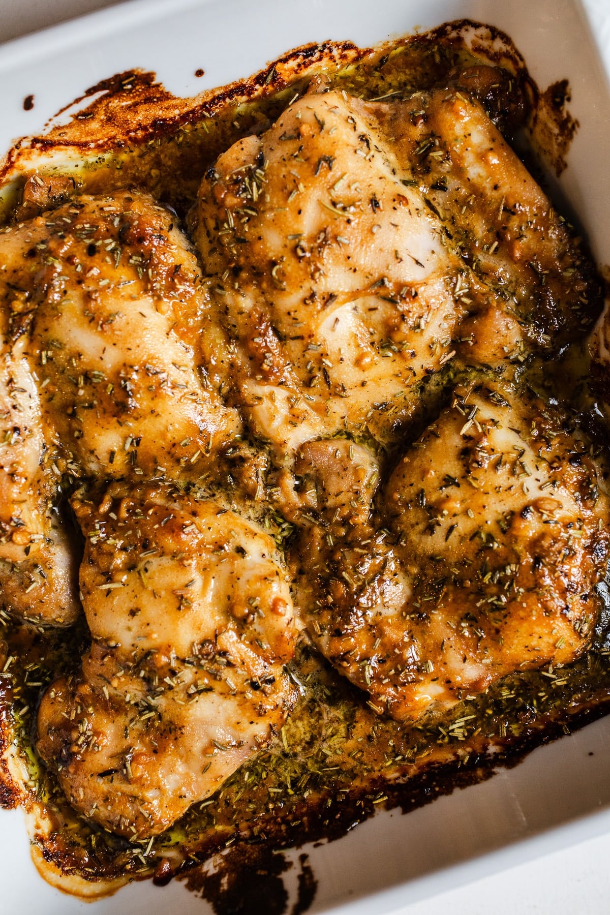 Dijon maple chicken in a baking dish.
